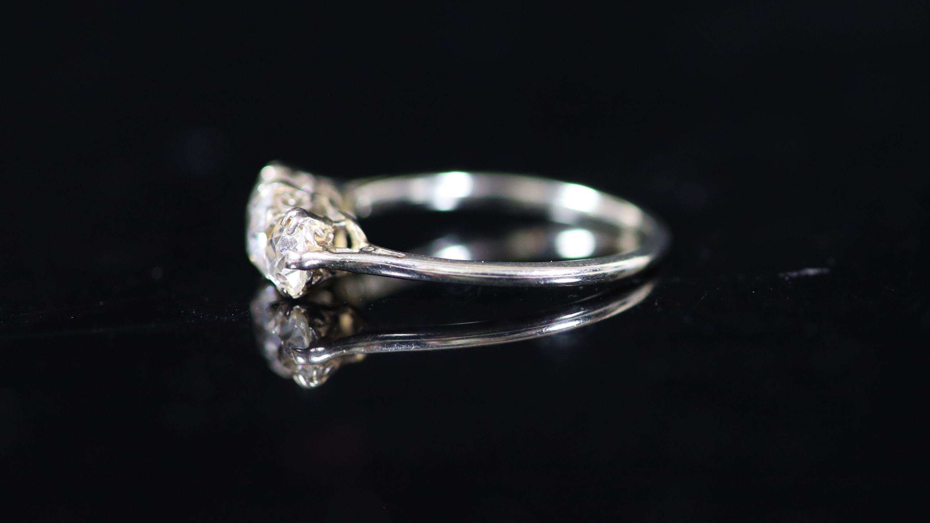 A white gold and three stone diamond set ring